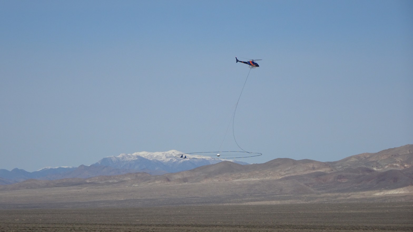 Helictopter conducts geological survey